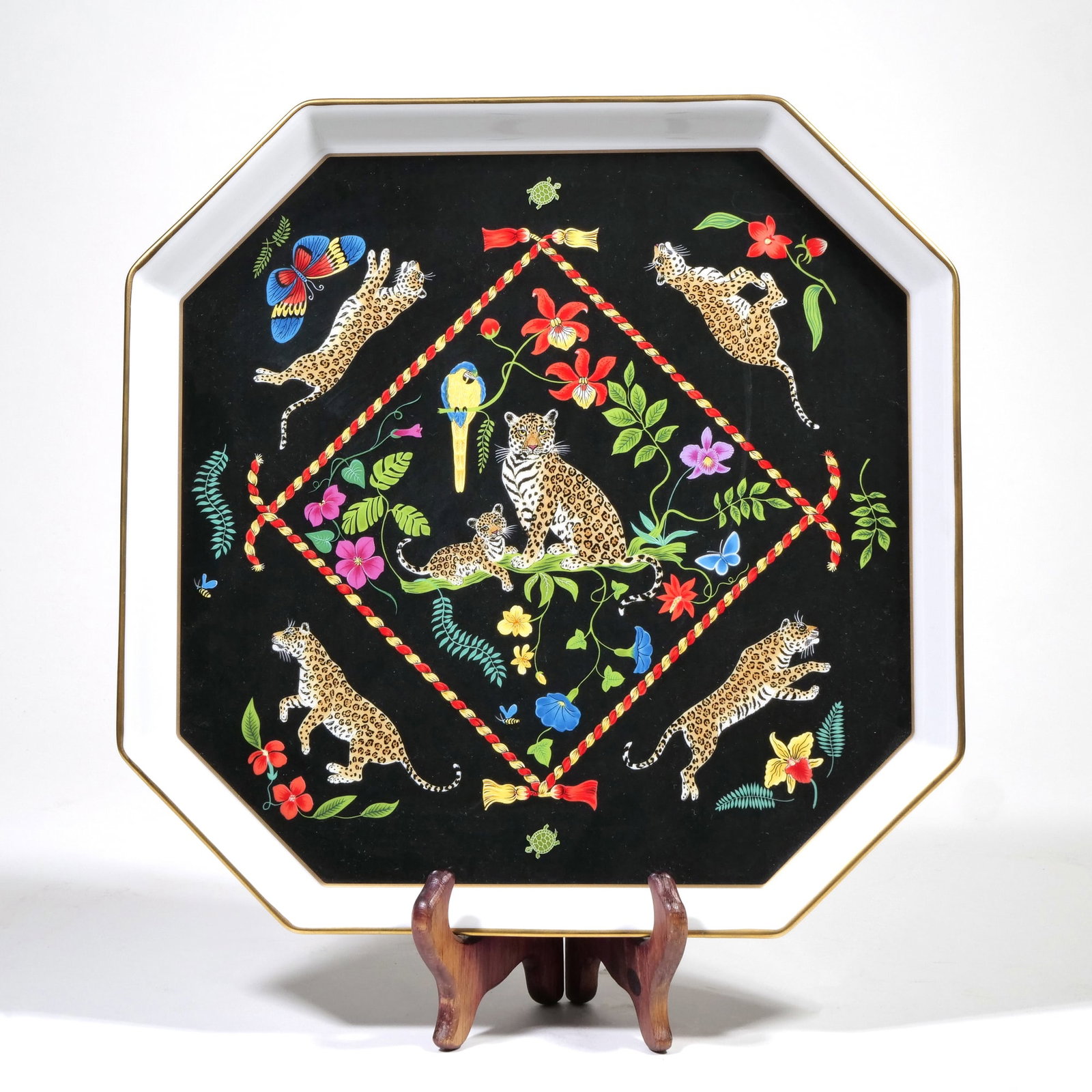 LYNN CHASE JAGUAR JUNGLE TRAY: Of octagonal shape and with gilt rim, marked on verso h. 12.5 x w. 12.5 in.