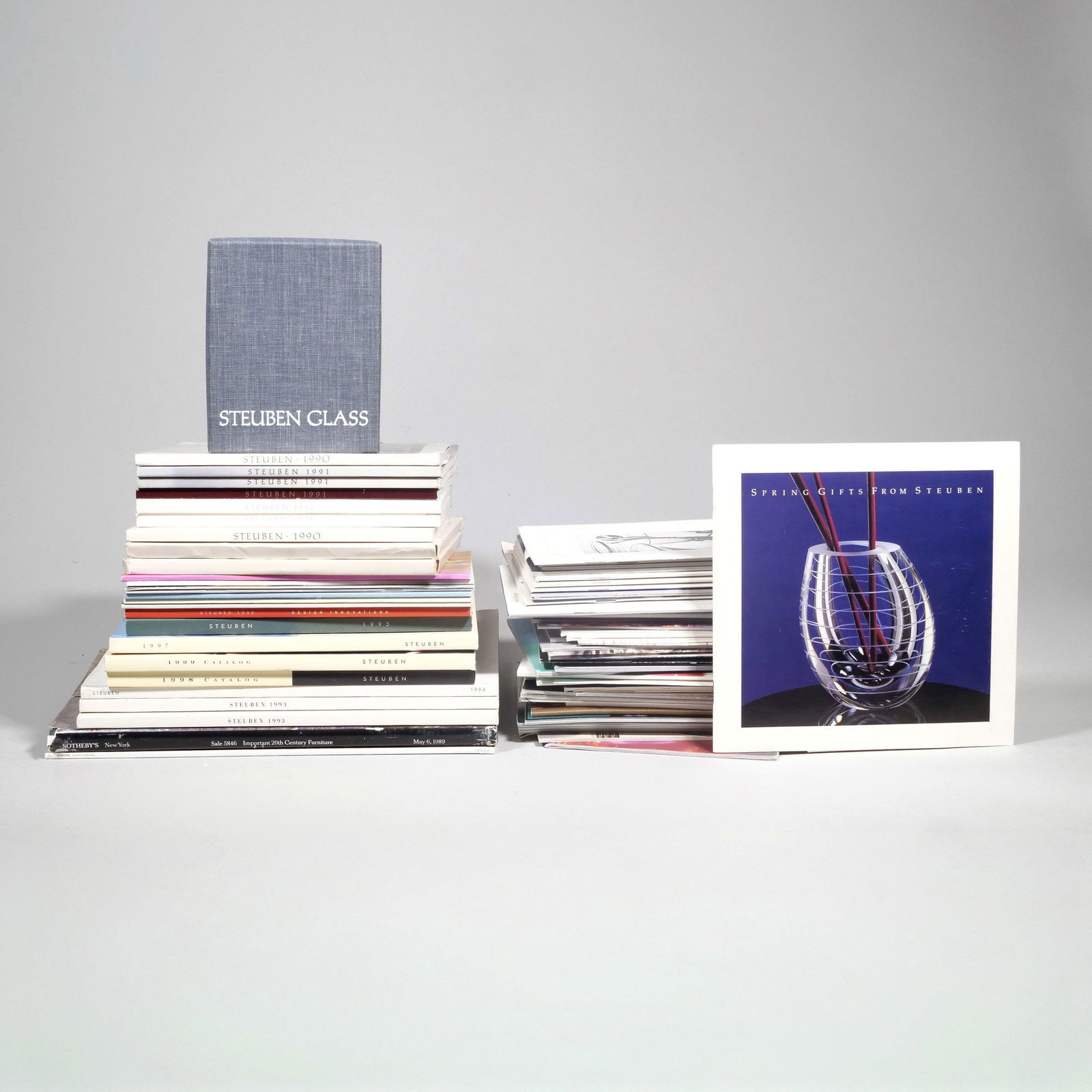 COLLECTION STEUBEN CATALOGS: A collection of Steuben Glass Co. catalogs and pamphlets, including Steuben 1990 - 1999 catalogs