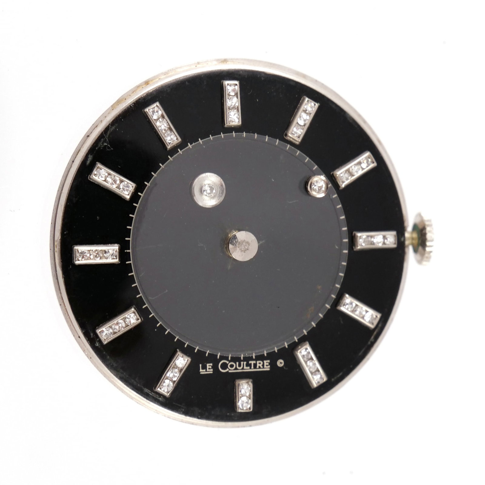 VACHERON & CONSTANTIN-LECOULTRE DIAMOND GALAXY MYSTERY DIAL 14K WHITE GOLD MAN'S WRISTWATCH: Man's wristwatch featuring a black mystery dial with two floating diamond-set markers representing the hands. The 14k white gold case is set with twelve diamond hour markers around the perimeter. The