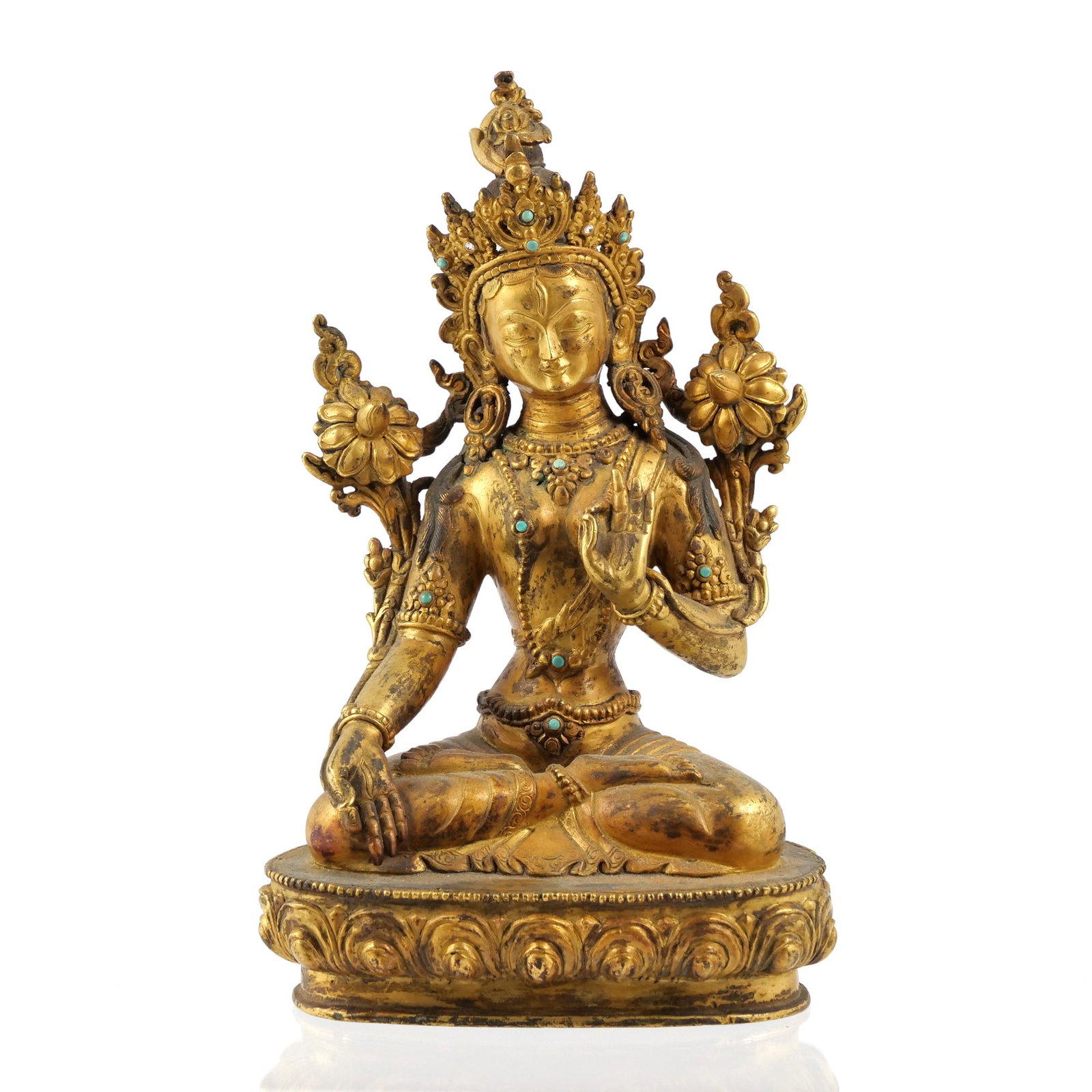 18TH/19TH C. SINO-TIBETAN GILT BRONZE SCULPTURE, GREEN TARA BODHISATTVA: Green Tara Gilt bronze with turquoise and stone insets h. 8.5 x w. 5.5 x d. 3.5 in. The deity is depicted seated on a double lotus throne with her hands in the varada and vitarka mudras, featuring a