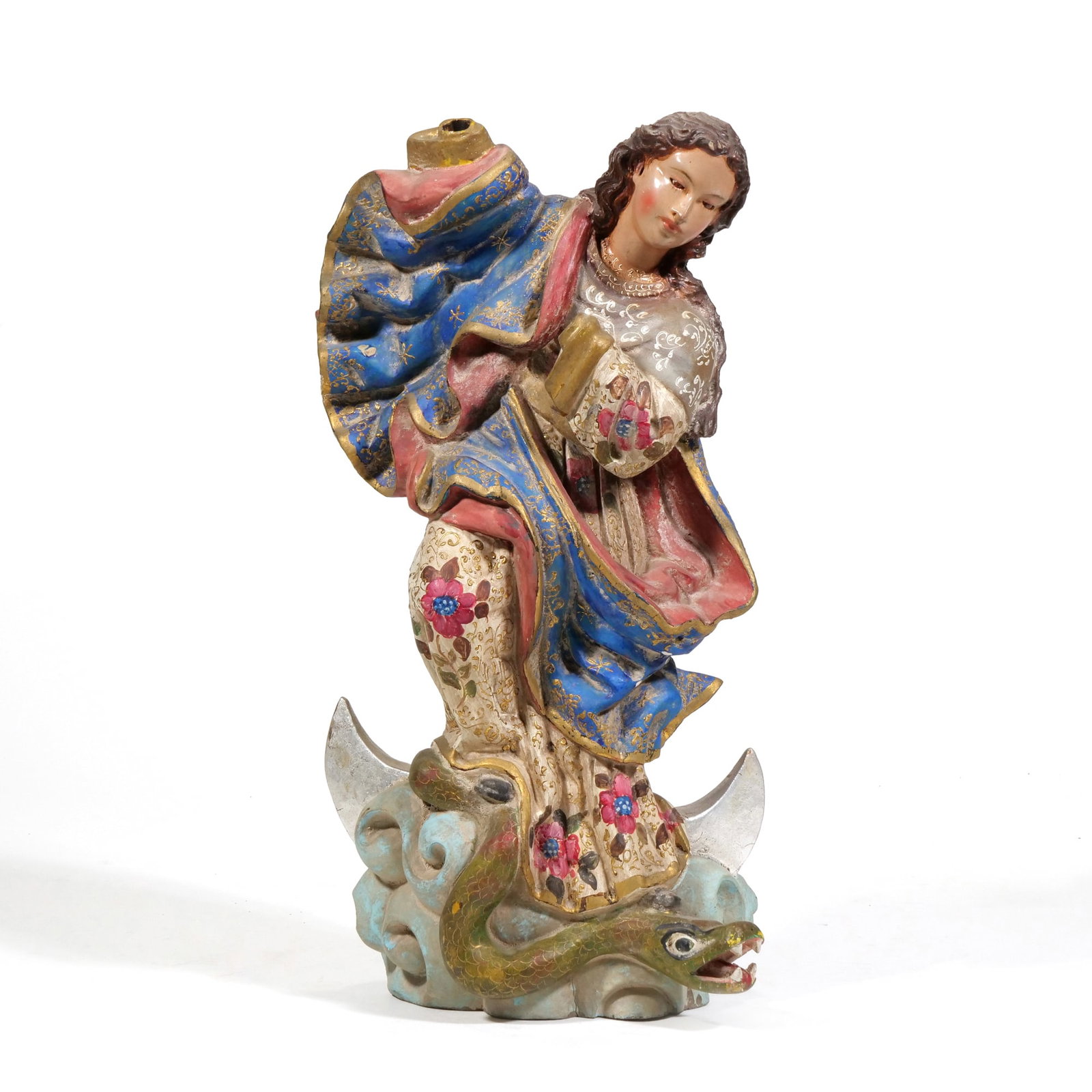 ECUADORIAN QUITO SCHOOL (18TH CENTURY) POLYCHROME WOOD SCULPTURE: The Immaculate Conception Polychrome and gilded carved wood h. 15.5 x w. 8.5 x d. 5 in. The figure is depicted in a blue mantle with gilded stars over a cream-colored gown with red and pink floral mot