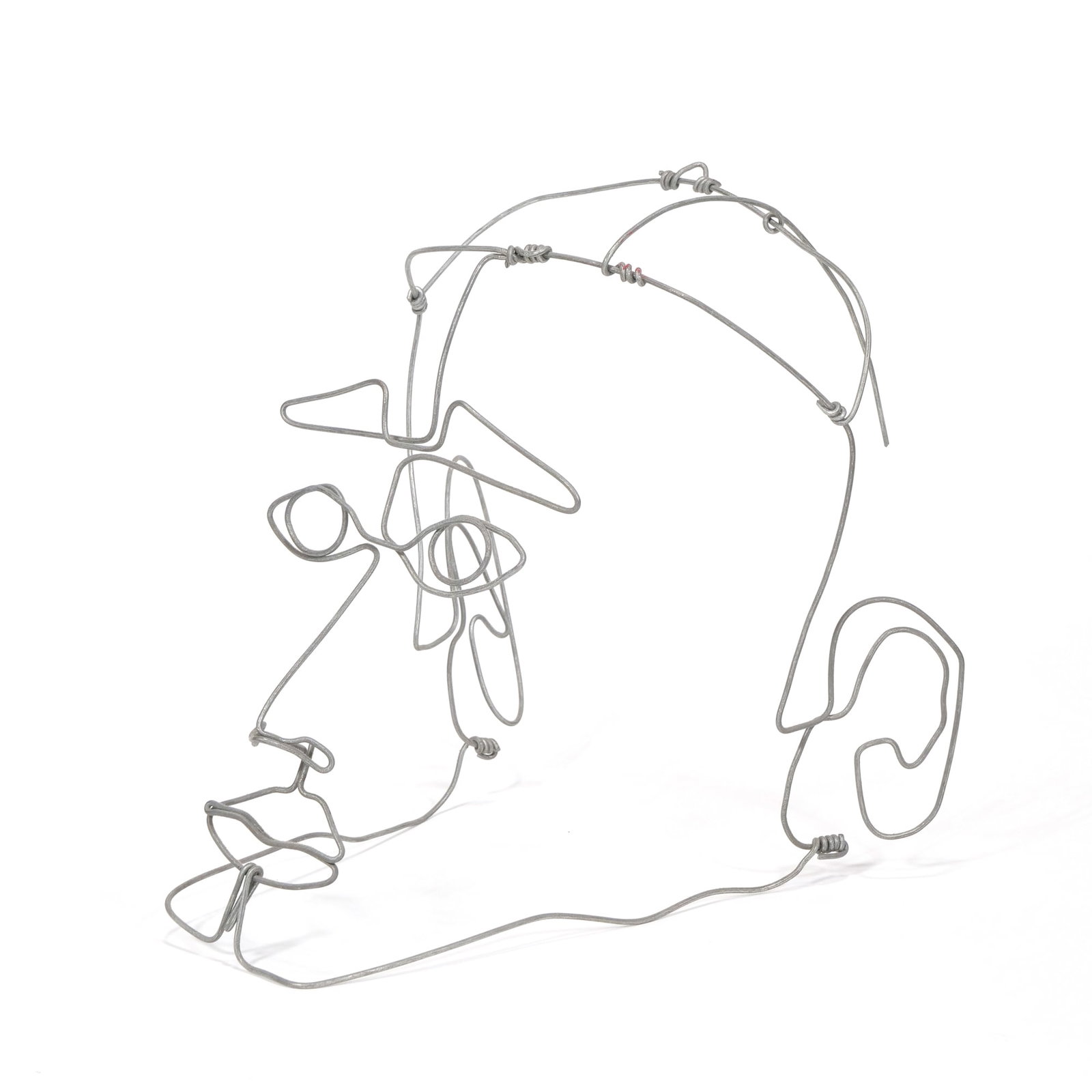 CONTEMPORARY ART WIRE SCULPTURE OF A FACE: untitled Wire sculpture h. 8 x w. 7 x d. 7.5 in. Three-dimensional sculpture of a human face rendered in a silver-toned metal wire using twisted junctions. - h. 8 x w. 7 x d. 7.5 in. Inventory No. 64-