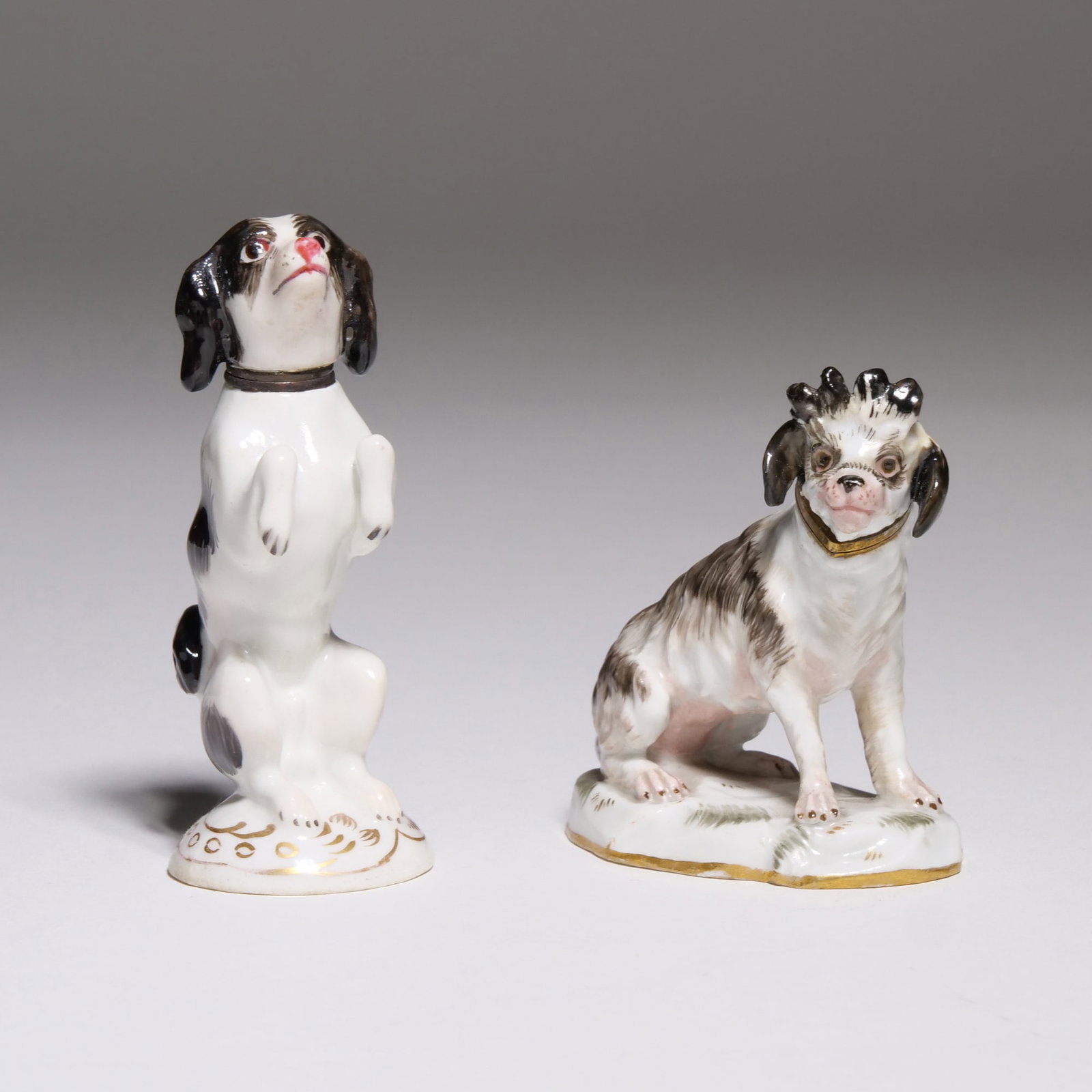 (2pc) MEISSEN FIGURAL DOG SCENT BOTTLE: Including a Meissen hand-painted porcelain figural cavalier dog scent bottle with metal mounts at collar, marked on the base with two blue crossed swords under the glaze and with impressed marking (ap