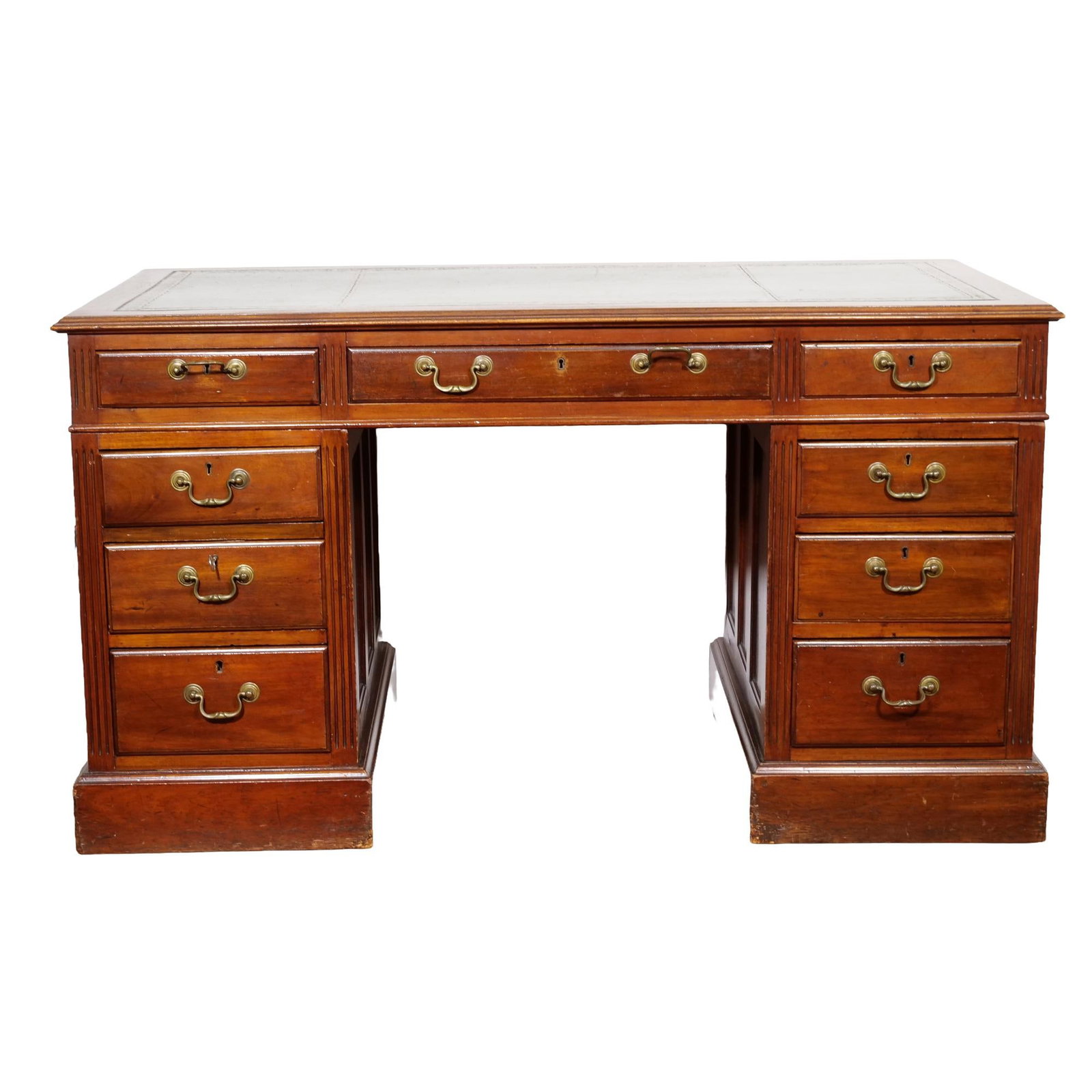 ENGLISH MAHOGANY PEDESTAL DESK WITH TOOLED LEATHER TOP: This mahogany pedestal desk features an inset three-panel green leather writing surface with gold-tooled borders. The configuration includes nine drawers arranged with a central kneehole drawer