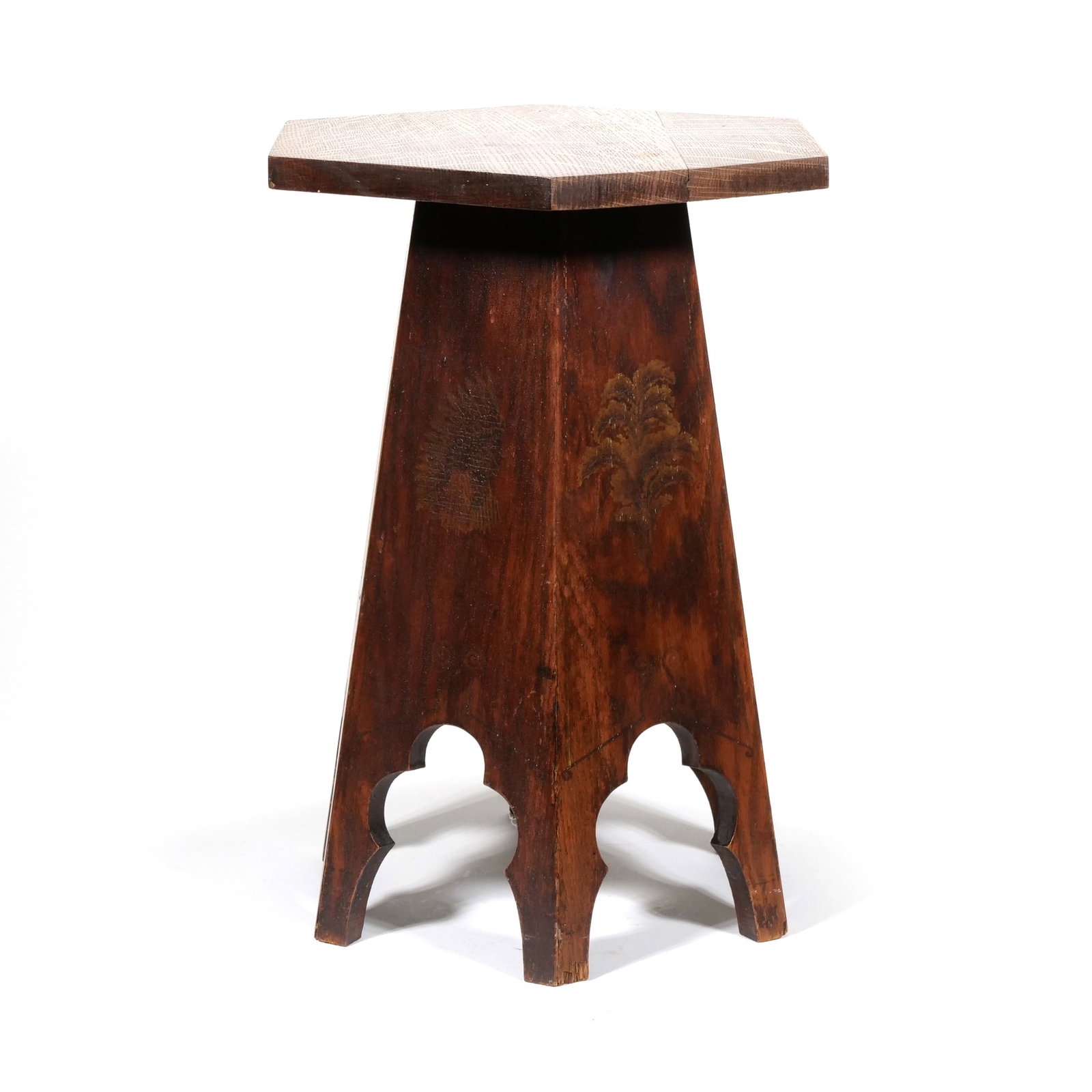 AMERICAN ARTS & CRAFTS PYROGRAPHY HEXAGONAL SIDE TABLE: Oak "Flemish Art" style side table featuring a hexagonal top and a tapered pedestal base with arched cutouts at the feet. The sides are decorated with pyrography imagery including a Native American