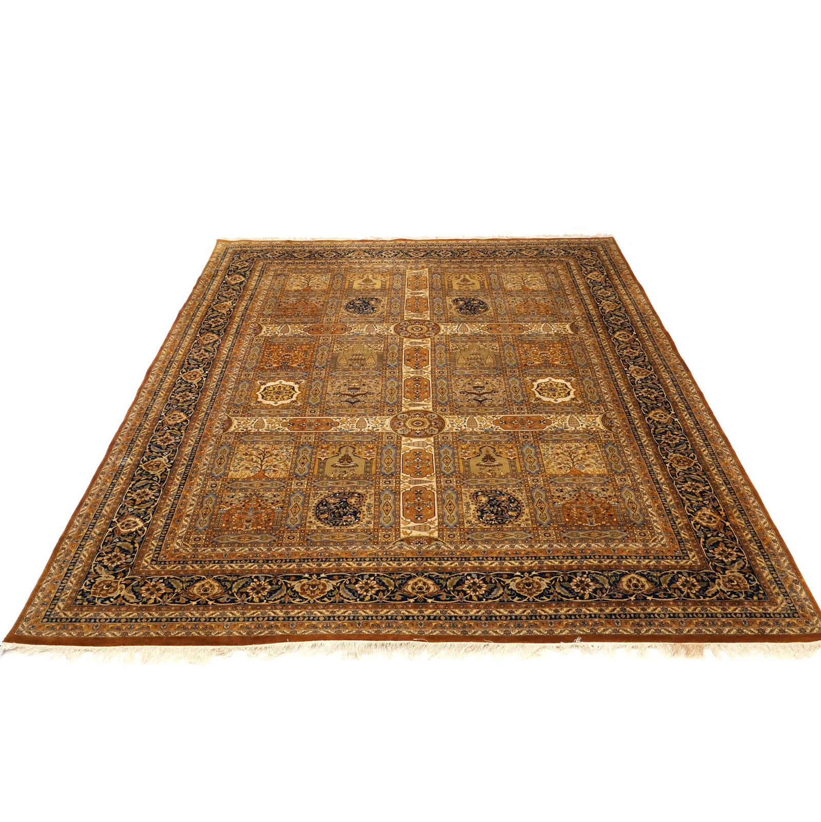 A MID CENTURY FINE RUG: Hand-knotted rug having a classical 'Chahar Bagh' garden design organized into a grid of rectangular panels, each panel displaying varying motifs such as mihrabs, trees of life, and floral