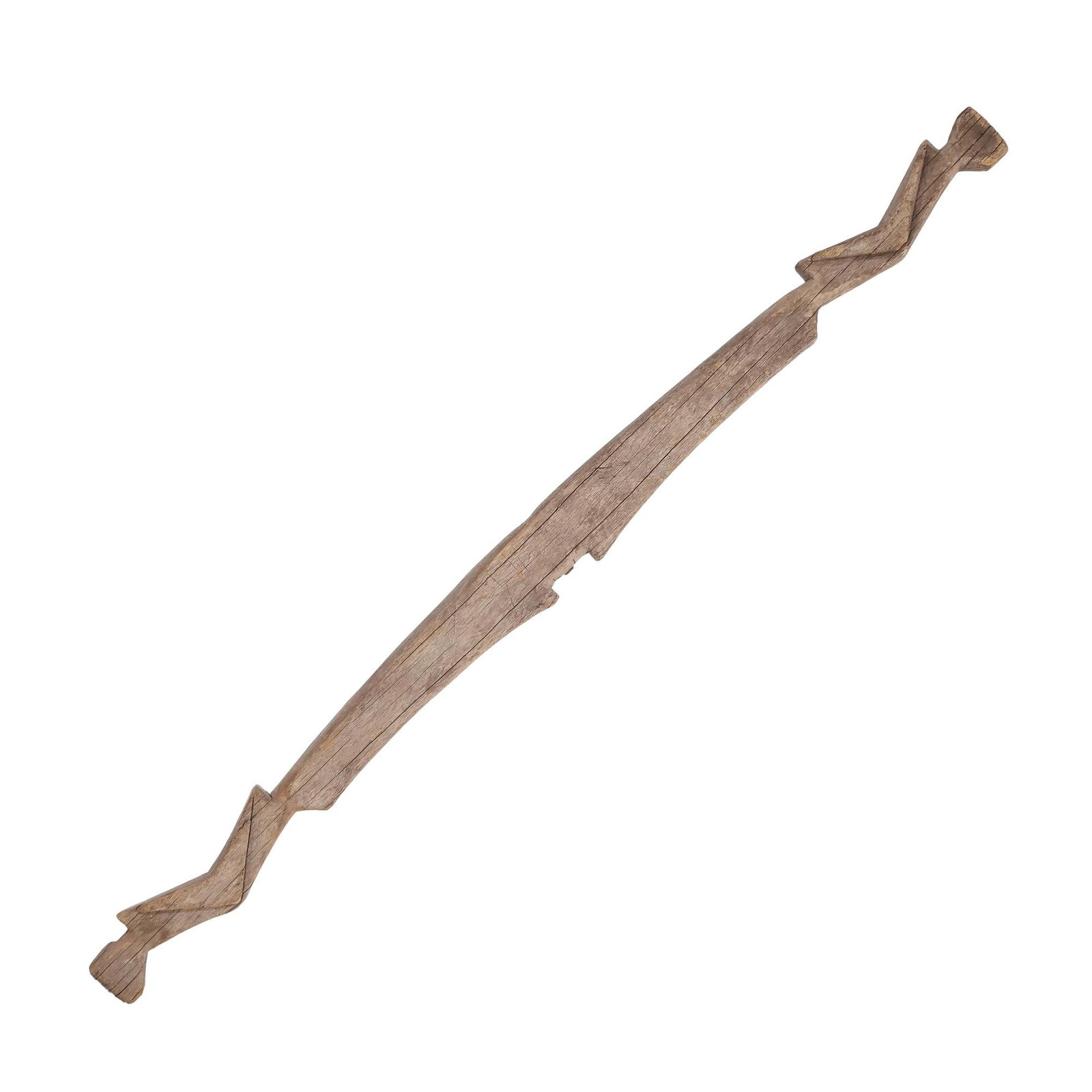 TRIBAL CARVED WOODEN OX YOKE: The item is a hand-carved wooden beam featuring stylized geometric terminals at both ends. It is constructed from a single piece of timber and contains a rectangular notch at the center of the span.