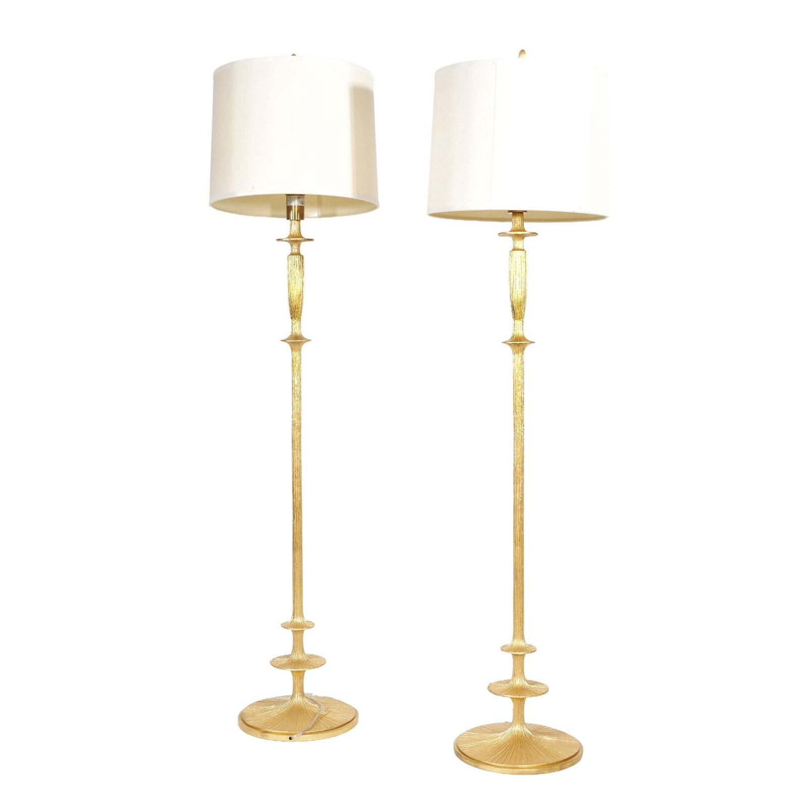 (2pc) PAIR OF FLOOR LAMPS: A pair of floor lamps having gold finish over a textured, ribbed metal body; 16.5 in. (shade diam.) / 13 in. (diam. at base) - h. 70 in. (over finial, approx.) Inventory No. 1AA-51 Provenance: From a 