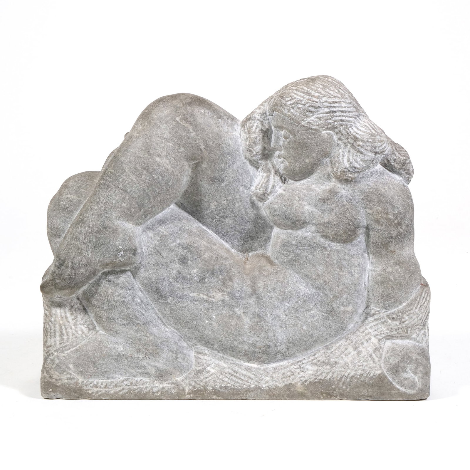 EUGEN GAUSS (AMERICAN, 1905-1988) STONE CARVING: Hand carved stone sculpture depicting a female figure en repose, with incised details for hair, with numbered marking to base - h. 9.75 x w. 4 x l. 12 in. Inventory No. 64-152 Provenance: Property fro