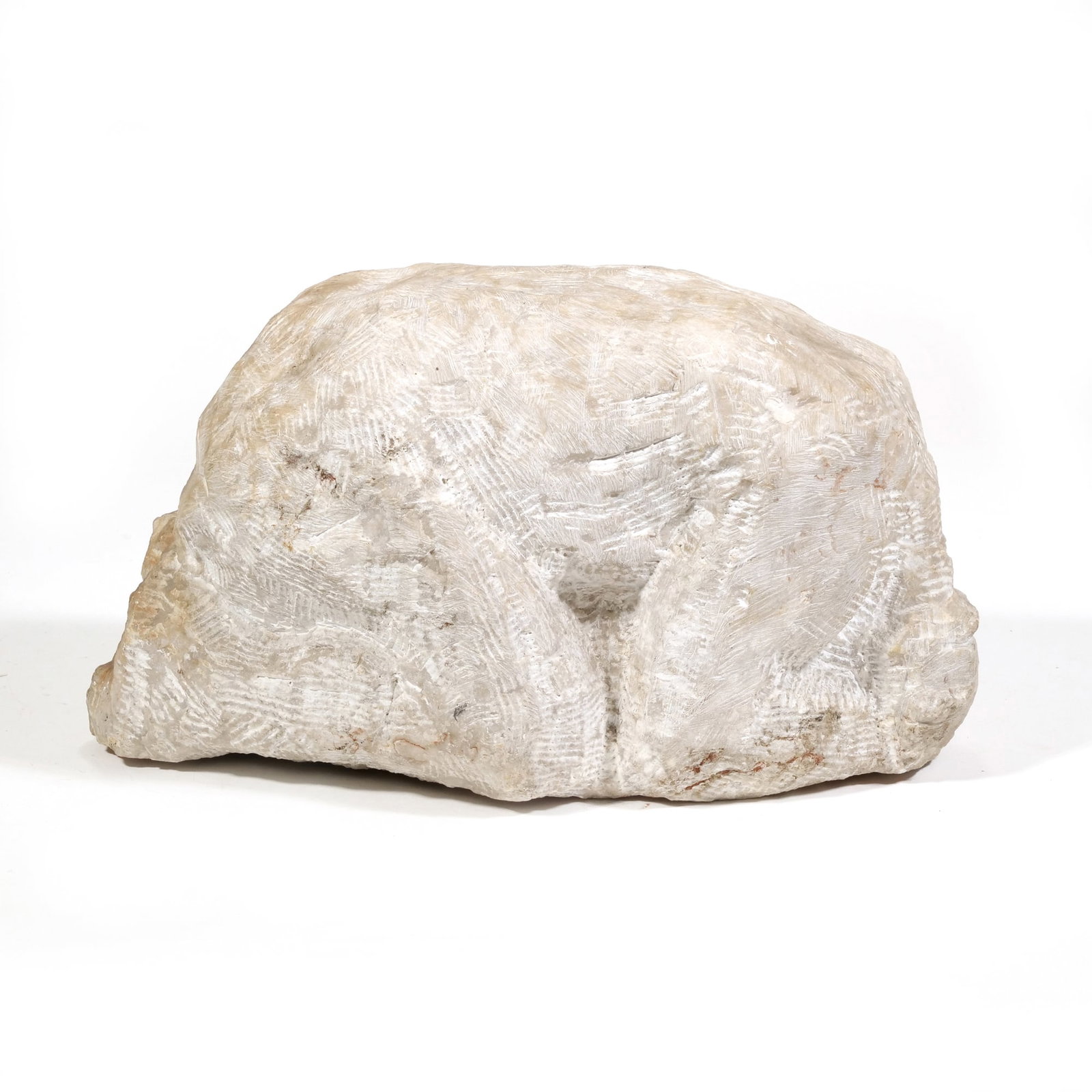 AMERICAN SCHOOL (20TH CENTURY) STONE SCULPTURE: untitled Carved stone h. 9.25 x w. 16 x d. 7.5 in., approx. Unsigned and depicting an abstracted crouching figure with prominent hatched tool marks throughout. - h. 9.25 x w. 7.5 x l. 16 in. (approx.)