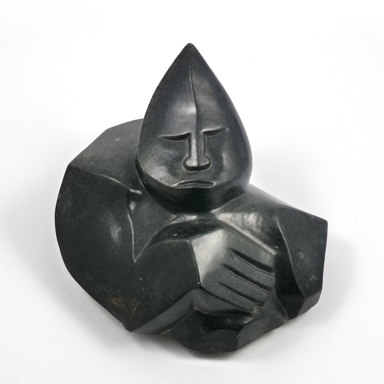 BLACK STONE ETHNOGRAPHIC CARVING: Sculpture of a figure hand carved from serpentine (or other heavy black stone), signed on base - h. 6.5 x w. 10 x l. 10 in. Inventory No. 93-70 Provenance: Items from the estate of a Greenwich, CT lad