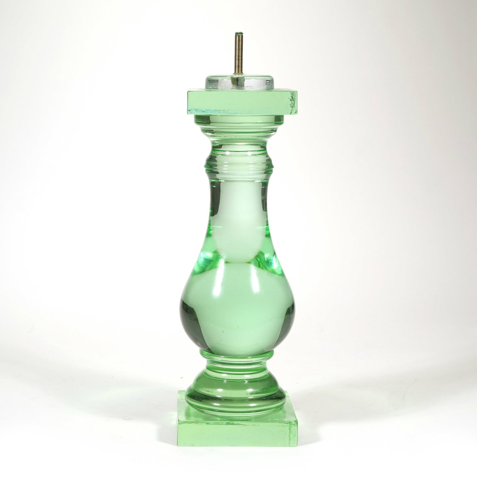 VAL SAINT LAMBERT STYLE GLASS TABLE LAMP: Heavy green glass table lamp featuring a sculptural baluster column on a square pedestal base. The transparent glass is capped with a square glass top housing a central threaded metal rod. The piece d