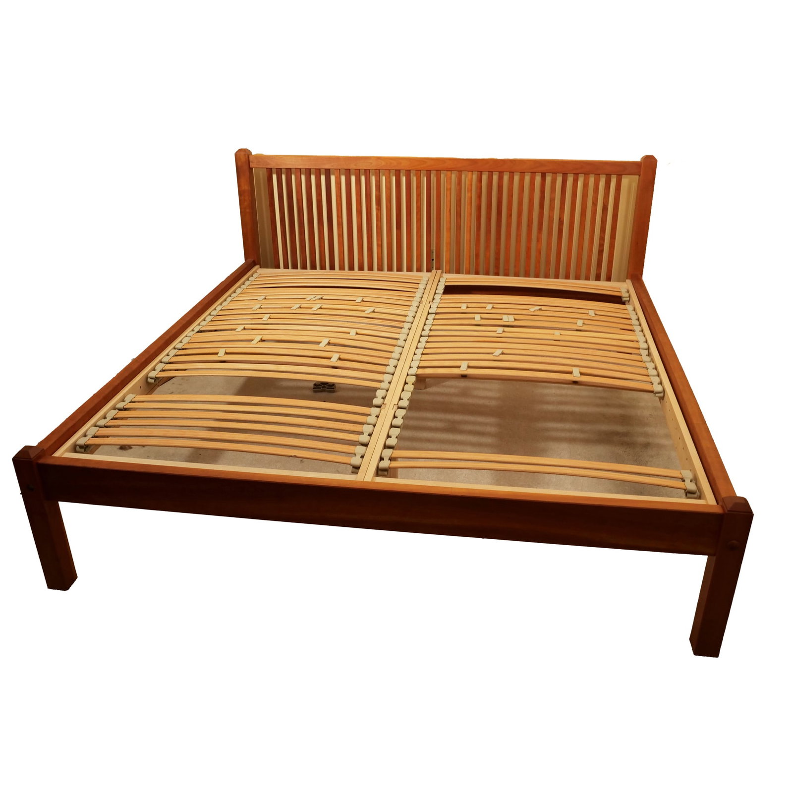 SCOTT JORDAN BESPOKE CHERRY WOOD SLAT BED FRAME: Solid wood bed frame featuring a high headboard with thin vertical slats and square corner posts. The design incorporates a dual flexible wooden slat support system supported by a center rail. Finishe