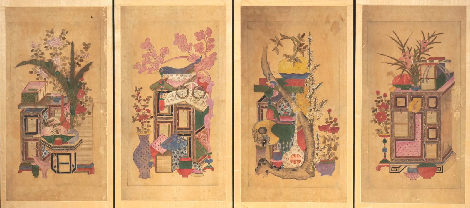 KOREAN SCHOOL (19TH/20TH CENTURY) CHAEKGEORI FOUR-PANEL SCREEN: Chaekgeori Ink and color on paper mounted to panels h. 32.25 x w. 64.5 in., overall Four-panel screen depicting scholar's accoutrements, books, and auspicious fruits and flowers, set within a wood fra