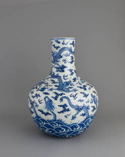 Chinese blue and white Tianqiu Ping: A Chinese blue and white porcelain vase decorated with nine imperial dragons (five-clawed) in nine different appearances identical to the stone carvings on the hillside outside the Forbidden City in