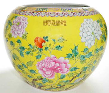 Very Fine Chinese Famille Rose Fish Bowl: A Very Fine Chinese Famille Rose Fish Bowl The exterior of the jardiniÃ¨re is elaborately decorated with large colourful peony flowers supported on leafy branches, below four red characters in seal