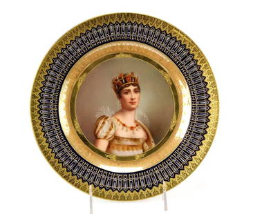 Royal Vienna Porcelain Portrait Plate: Royal Vienna hand-painted porcelain plate with portrait of Josephine, raised enamel and gilt decoration, artist signed on arm 'Bauer', 9 1/2" diameter.