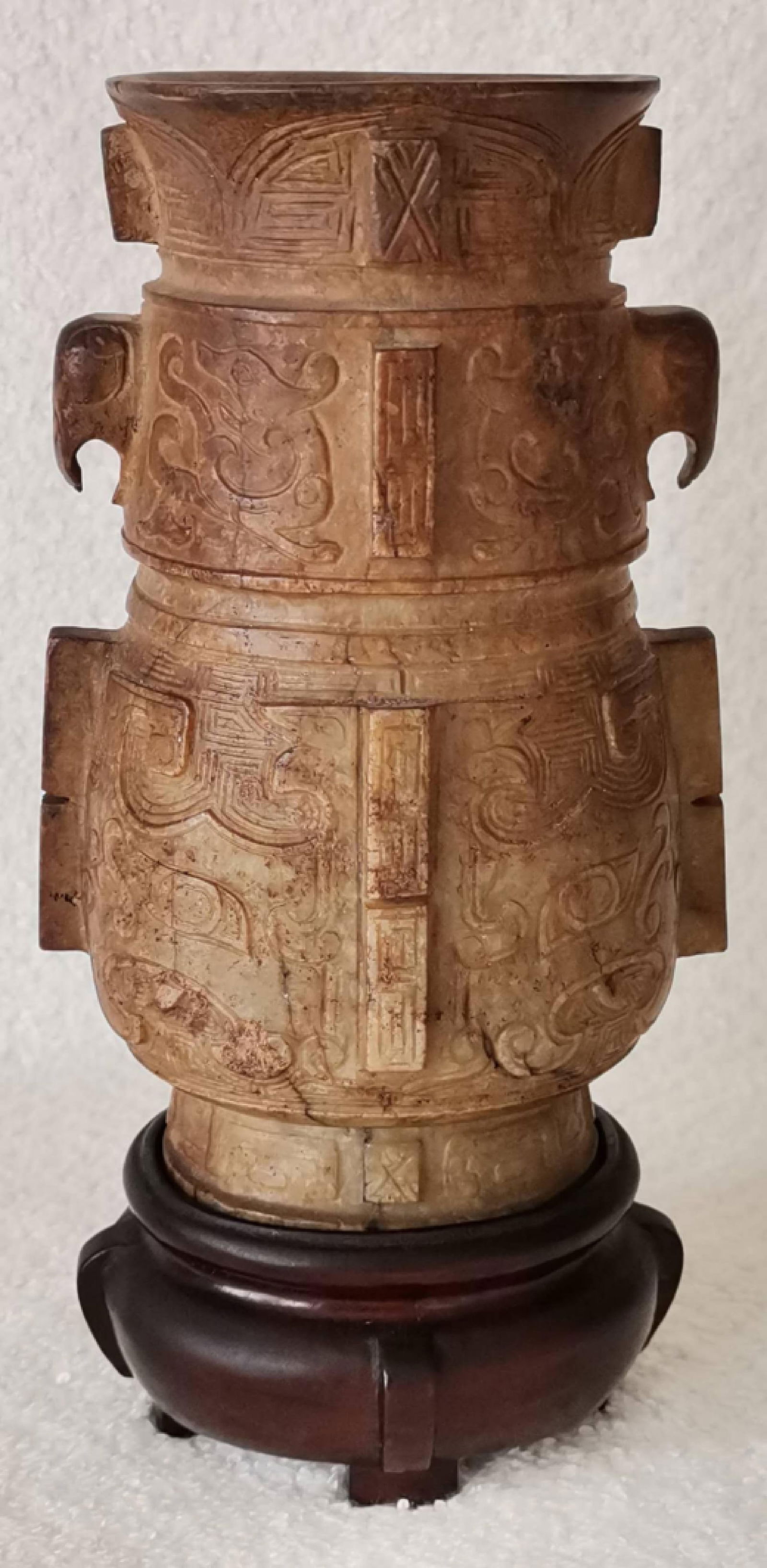 AN UNUSUAL CARVED KUI DRAGON WITH ELEPHANT EAR VASE 
 (1 of 2)