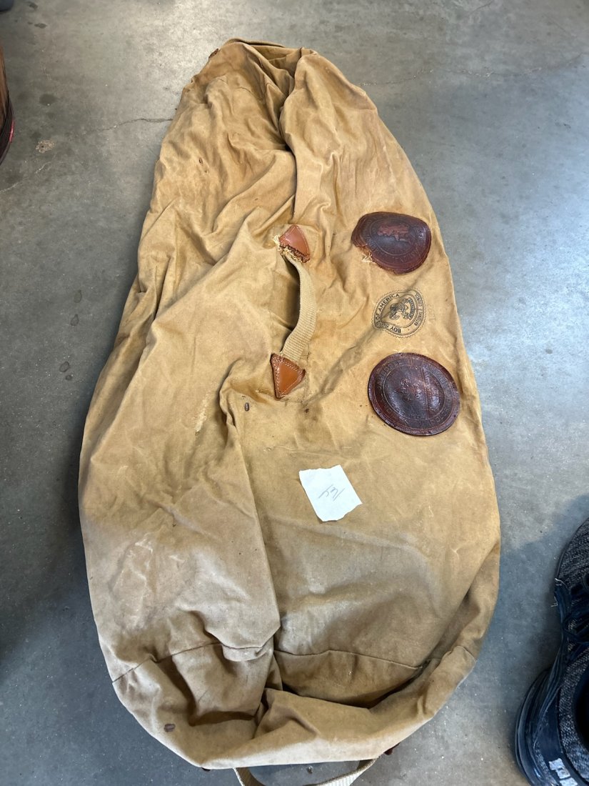 Vintage Boy Scouts of America Duffle Bag: Vintage Boy Scouts of American duffle bag with patches in leather of Boy Scouts of American National Council and Colorado Springs, CO, original handles, 44"