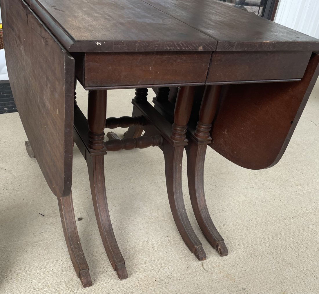 True Duncan Phyfe Mahogany Table: True Duncan Phyfe mahogany drop leaf table, can hold extra leaves to extend to seat up to 8 people. 32" x 42"
