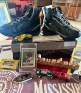 15 Piece Lot Sports Memorabilia: 15 Piece plus lot of various sports memorabilia, Nike Air Jordan shoes in original box, small matchbox toys, antique MS State College, MSU penant in platic, MSU, Tupelo Golden Wave, Rhodes College ite