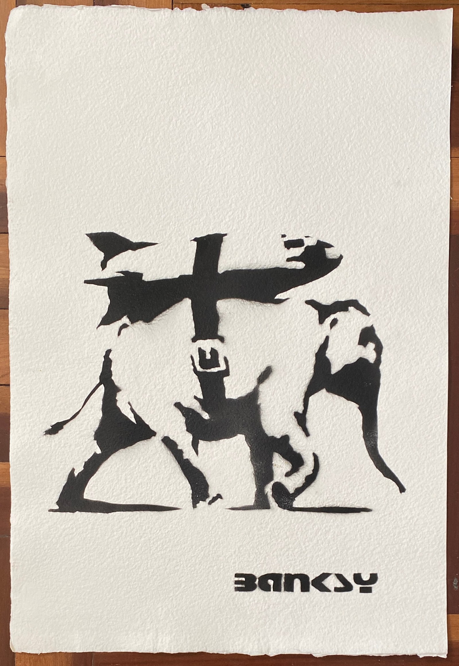 BANKSY (B. 1974), STENCIL SPRAY ON PAPER (Style Of): This lot consists of a Stencil Spray On Paper in the style of the painter Banksy. Banksy is a British street artist. He is one of the most media-savvy and controversial figures in the art scene of the