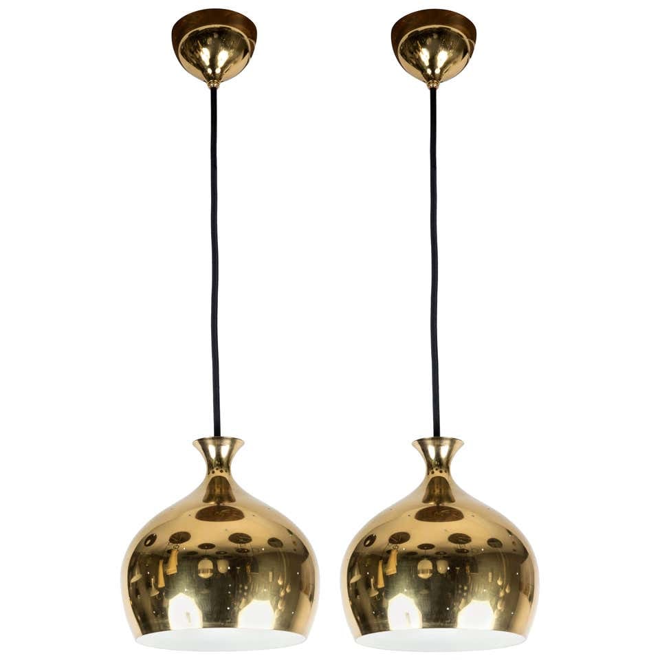 Pair of 1960s Brass Perforated 'Onion' Pendants by Helge Zimdal for Falkenberg: Quantity: 2 lamps Pair of 1960s brass perforated 'Onion' pendants by Helge Zimdal for Falkenberg, circa 1960s. Executed in perforated brass and metal. Helge Zimdal (Designer),Falkenberg (Maker)