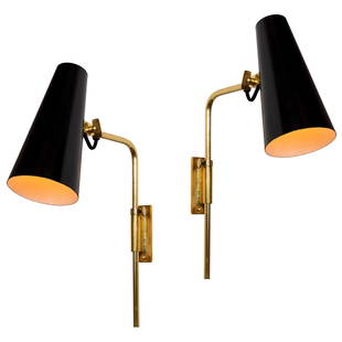 Pair of 1950s Paavo Tynell 9459 Wall Lights for Taito OY: Quantity: 2 lamps Pair of 1950s Paavo Tynell 9459 wall lights for Taito OY. Executed in black painted metal with attractively patinated brass armature and hardware. Signed with impressed manufacturer'