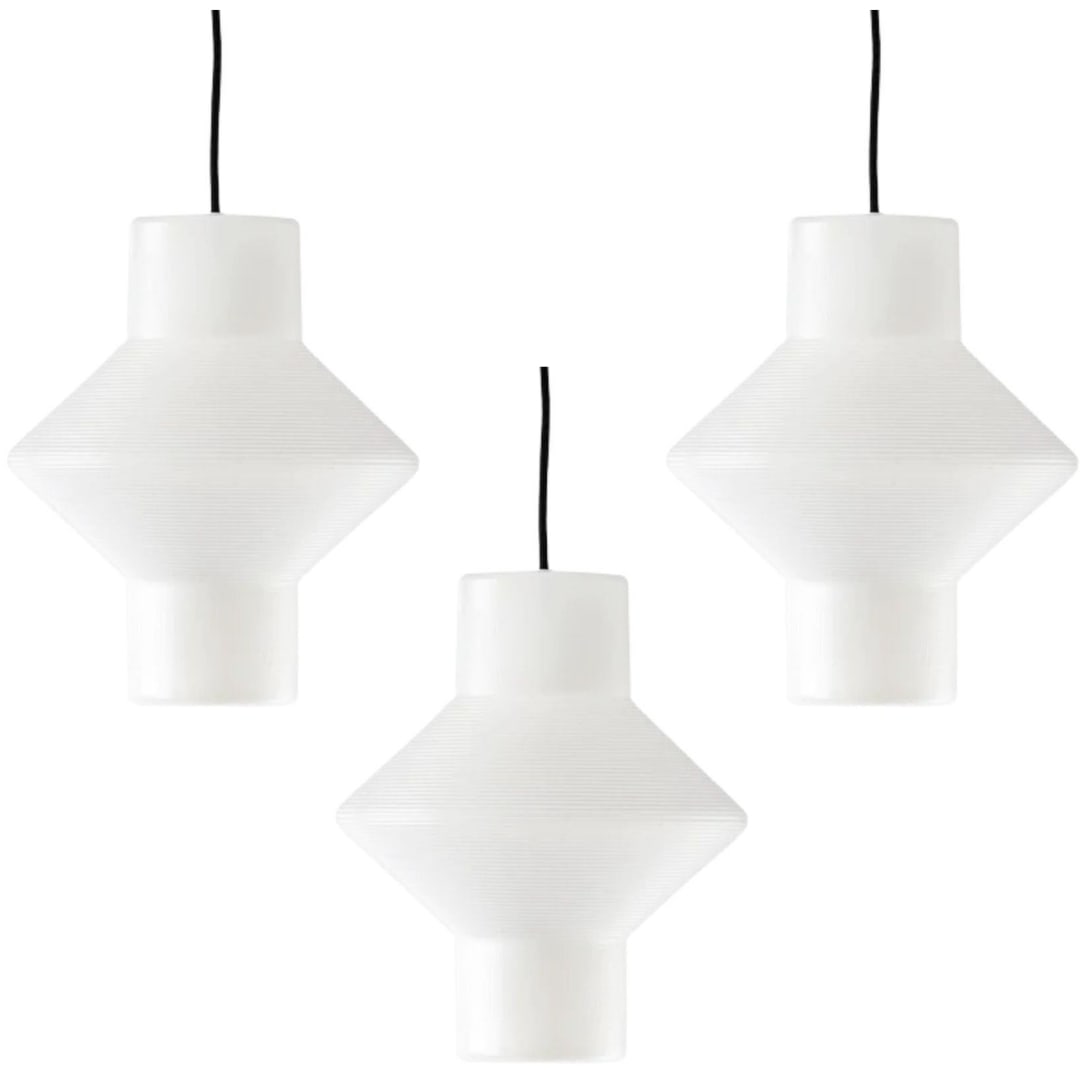 Set of 3 Tapio Wirkkala Centro 310 Pendant for Innolux: Quantity: 3 Set of 3 Tapio Wirkkala Centro 310 Pendant for Innolux. The geometric, lightweight Centro pendant light was designed by Tapio Wirkkala in 1961. The lantern-like polyethylene luminaire was