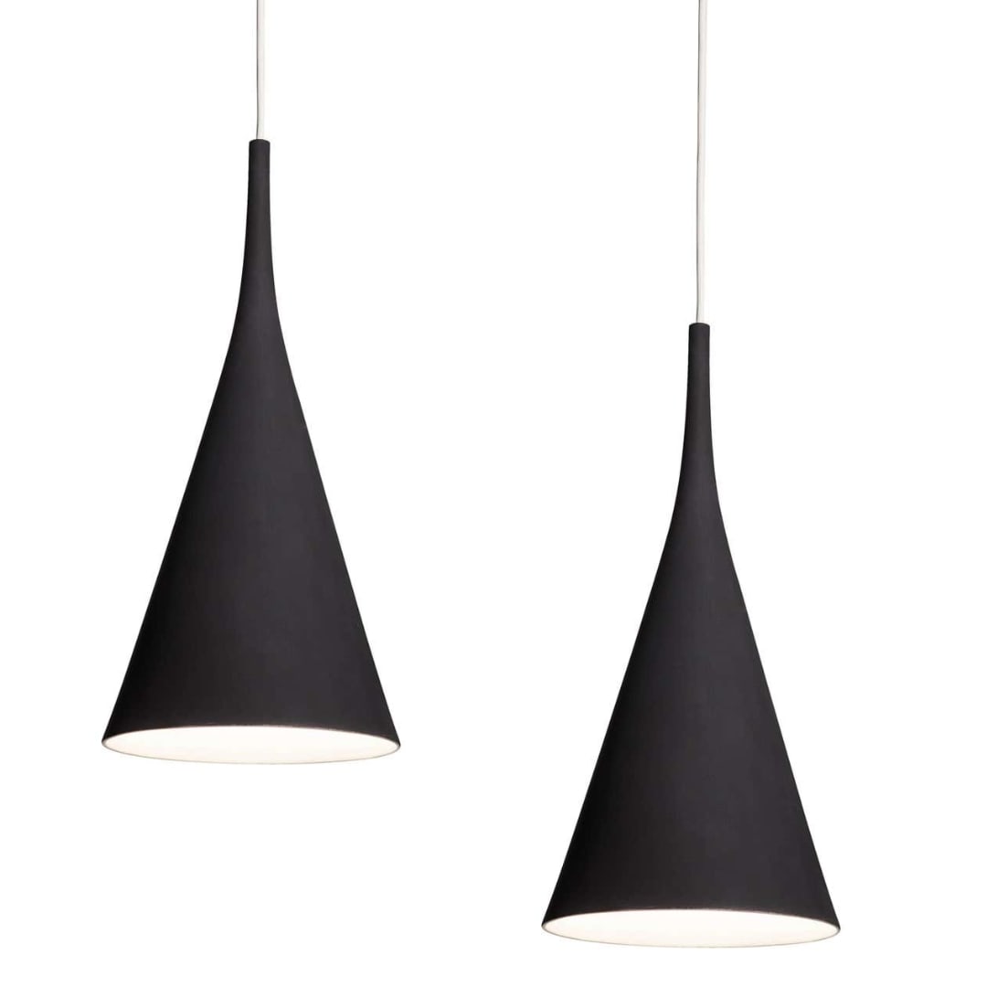 Pair of Samuli Naamanka 'Lambada Savu' Ceramic Pendants in Black for Innolux: Quantity: 2 lamps Pair of Samuli Naamanka 'Lambada Savu' Ceramic Pendants in black for Innolux. Crafted using a production technique known as ash glazing to create a unique surface texture and earthy