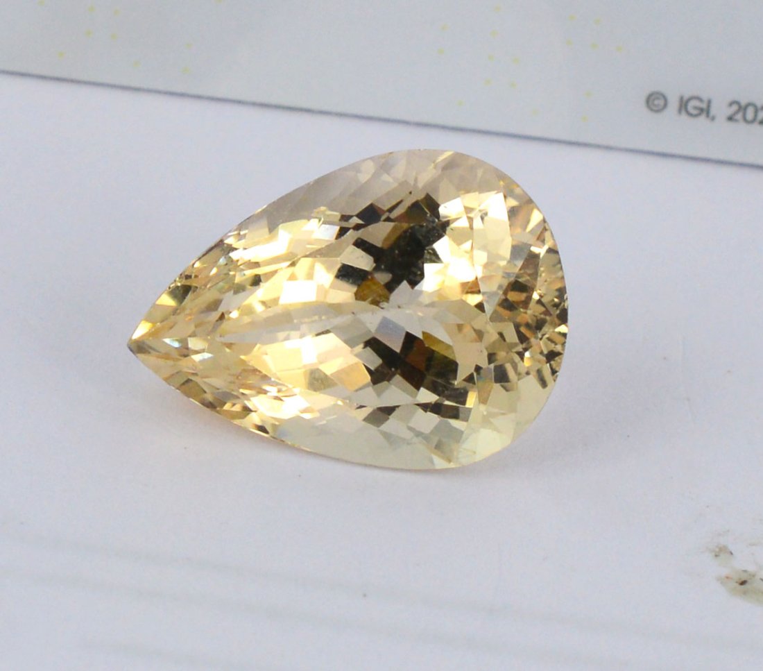 IGI Certified 9.60 Carat Natural Heliodor loose Stone: IGI Certified 9.60 carat Natural Heliodor loose Stone stone: Natural HeliodorShape: Pear Mixed Cut Weight: 9.60 CaratMM: 16.89x12.18x9.15 MMColor: Light Yellow BrownCertificate No.:560225339 Shipping 