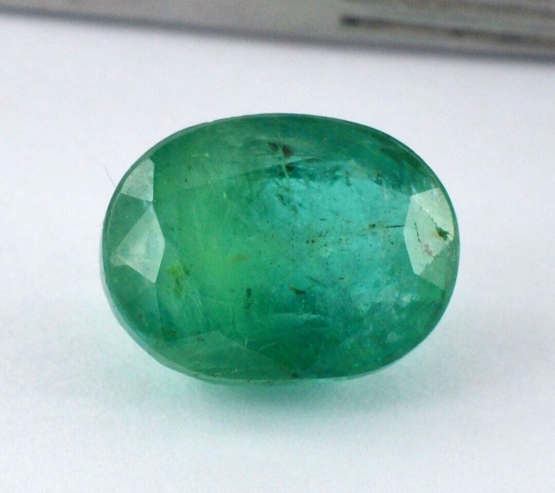 GSI Certified 7.15 Carat Natural Emerald Loose Stone: GSI Certified 7.15 Carat Natural Emerald- Oval Cut Loose Stone 13.11x9.98x7.77 MM