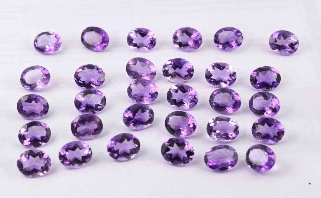 Certified Natural Amethyst Loose Lot: Natural Amethyst Loose Lot Natural Amethyst Loose Lot 77.00 Carat - 32 Pics Shape - Oval Cut Color Violet Blue