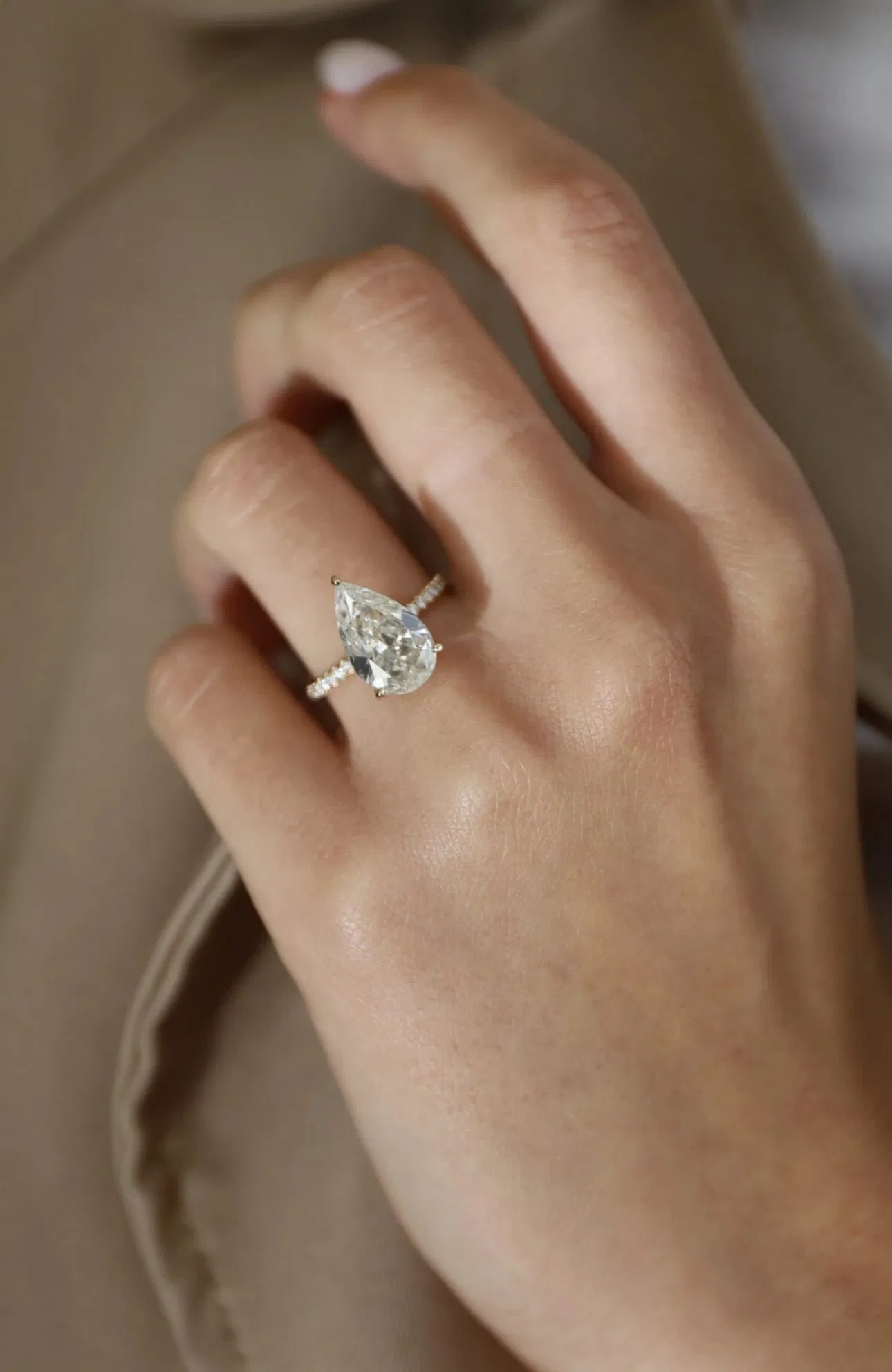 Certified 5 Carat Pear Cut 18kt Solid White Gold Lab Grown Engagement Diamond Ring: Certified 5 Carat Pear Cut 18kt Solid White Gold Lab Grown Engagement Diamond Ring E VVS1 - Ring Size US -7 -- Side Diamonds 0.50 Carat Round Cut VVS1 H Color Ring Resize Available free of Cost, - Fre