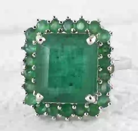 8.00 Carat IGI Certified Natural Emerald Ring 14KT Solid White Gold Ring: IGI Certified Natural Emerald RingIGI Report - Number 64J4269823 Metal: 14kt Solid White GoldStone - Green Emerald Stone Measurements - 11.51X9.98X7.01 mmStone Weight - 8.00 Ct Stone Shape - Round Cut