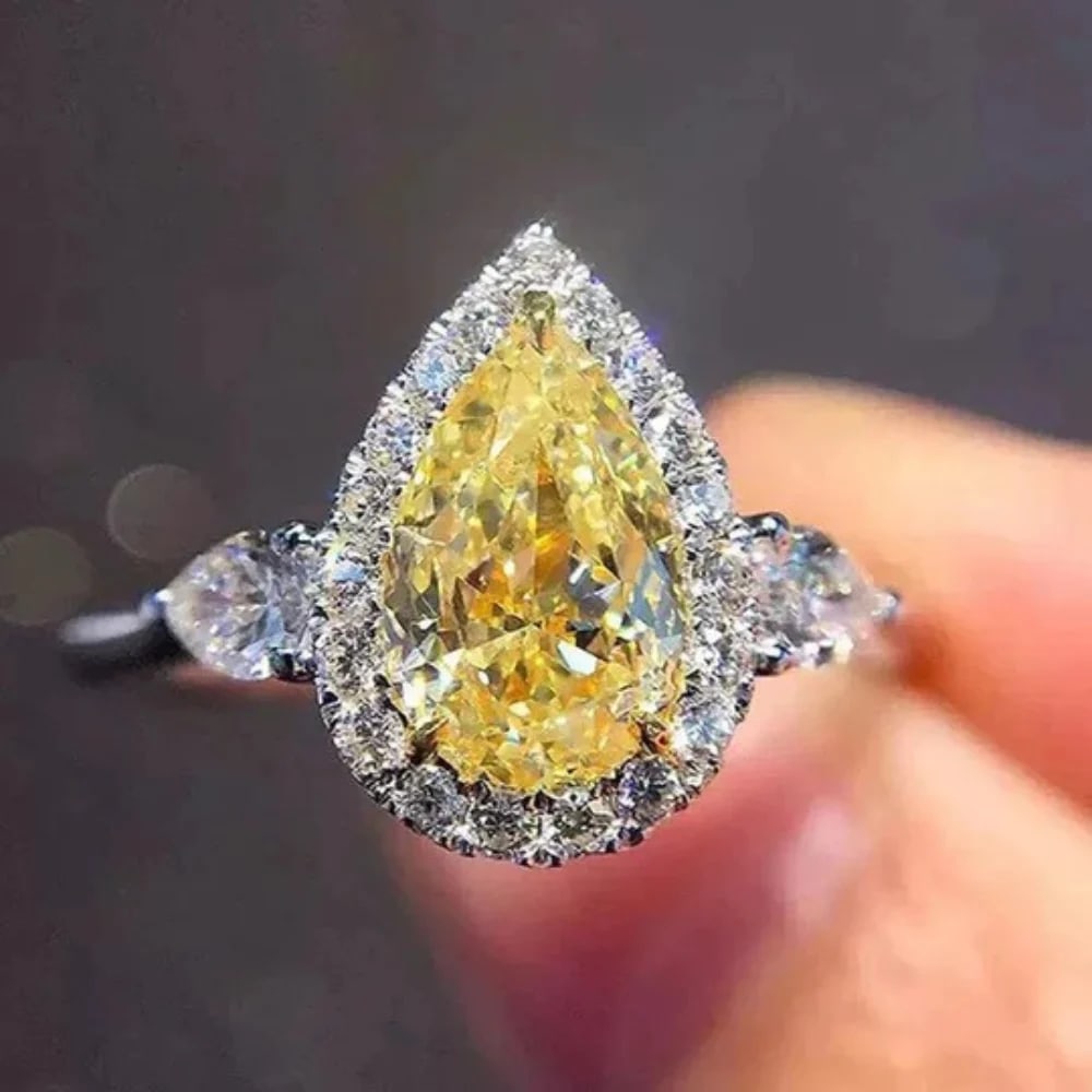 Certified 1.34 Carat Natural Diamond Yellow Color 14kt Solid White Gold Engagement Ring: Certified 1.34 Carat Pear Cut SI1 Natural Diamond Yellow Color 14kt Solid White Gold Engagement Ring - Side Stone is Natural Diamonds VS1 E Color Pear Cut 0.40 CT - Ring Size US 6.5