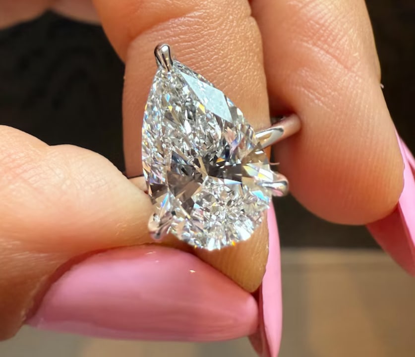 Certified 6.50 Carat Pear Cut Lab Grown Diamond D VVS1 Color 14kt Solid White Gold Engagement Ring: Certified 6.50 Carat Pear Cut Lab Grown Diamond D VVS1 Color 14kt Solid White Gold Engagement Ring - Side Stone Lab Grown Diamonds 0.40 CT Round Cut VS1 E Color - Ring Size US 6.5