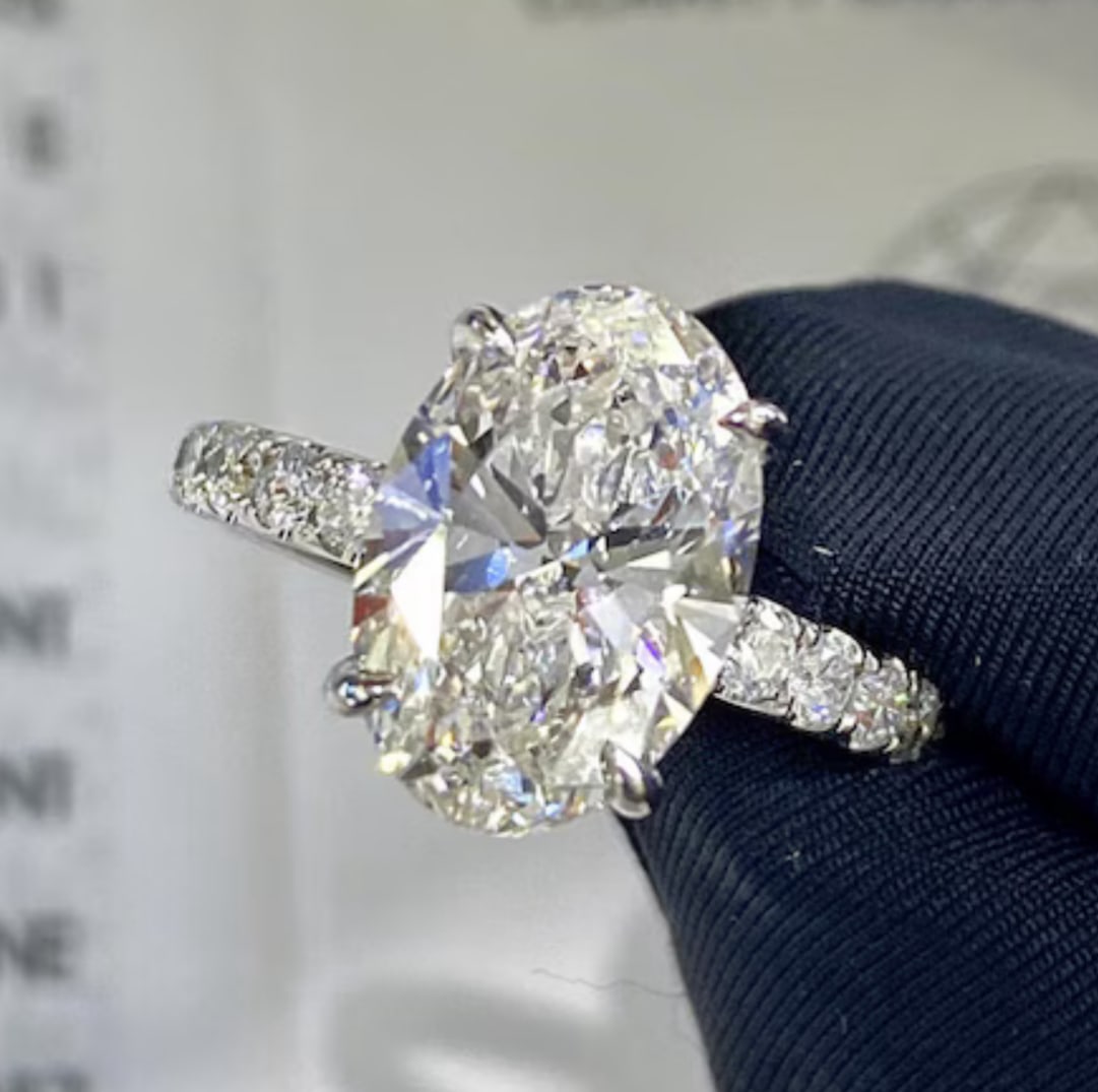 Certified 5.5 Carat Oval Cut Lab Grown Diamond D VVS1 Color 14kt Solid White Gold Engagement Ring: Certified 5.5 Carat Oval Cut Lab Grown Diamond D VVS1 Color 14kt Solid White Gold Engagement Ring - Side Stone Lab Grown Diamonds 0.60 CT Round Cut VS1 E Color - Ring Size US 6