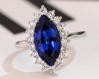 Certified 5 Carat Marquise Cut Lab Grown Blue Sapphire 14K Solid White Gold Engagement Ring: Certified 5 Carat Marquise Cut Lab Grown Blue Sapphire 14K Solid White Gold Engagement Ring - Ring Size US 7 Side Stone is VVS1 D Color Round Lab Grown Diamonds Cut 0.50 Ct - Excellent Luster -Free Re