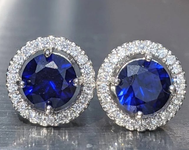 Certified 4.00 Carat Round Cut Lab Grown Blue Sapphire 14Kt Solid White Gold Earrings: Certified 4.00 Carat Round Cut Lab Grown Blue Sapphire 14Kt Solid White Gold Earrings - Side Stone is VVS1 D Color Round Cut Lab Grown Diamonds 0.40 Ct - Excellent Luster -& Free Shipping