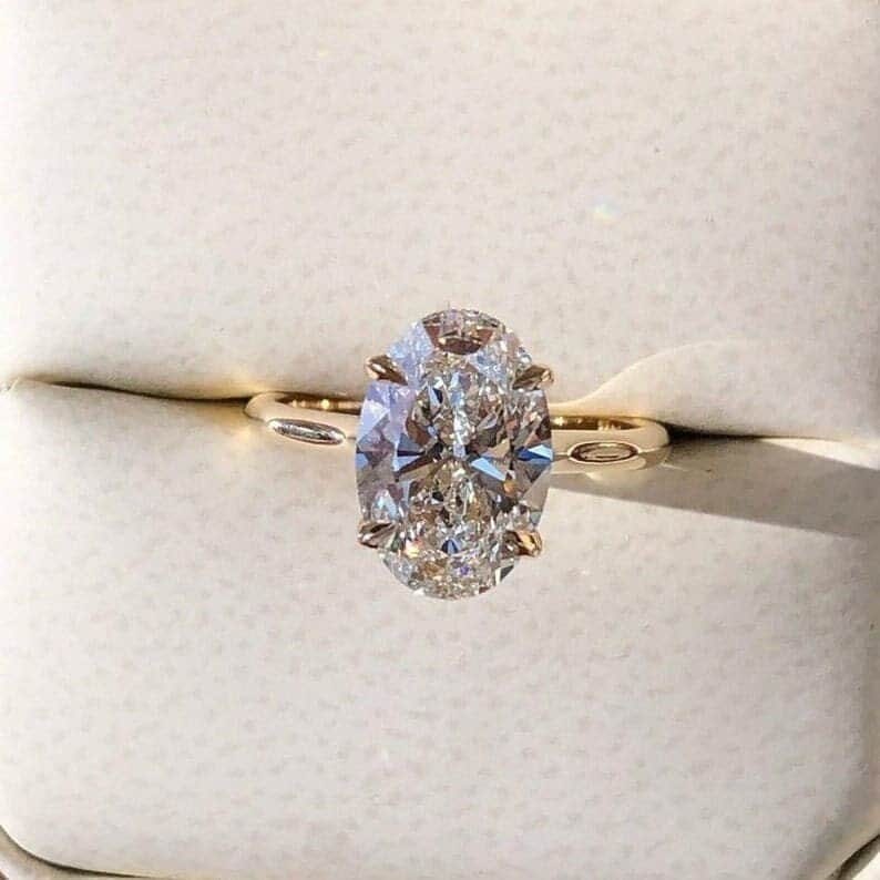 Certified 2 Carat Oval Cut Lab Grown Diamond D VVS1 Color 14kt Solid Yellow Gold Engagement Ring: Certified 2 Carat Oval Cut Lab Grown Diamond D VVS1 Color 14kt Solid Yellow Gold Engagement Ring - Side Stone Lab Grown Diamonds 0.30 CT Round Cut VS1 E Color - Ring Size US 7