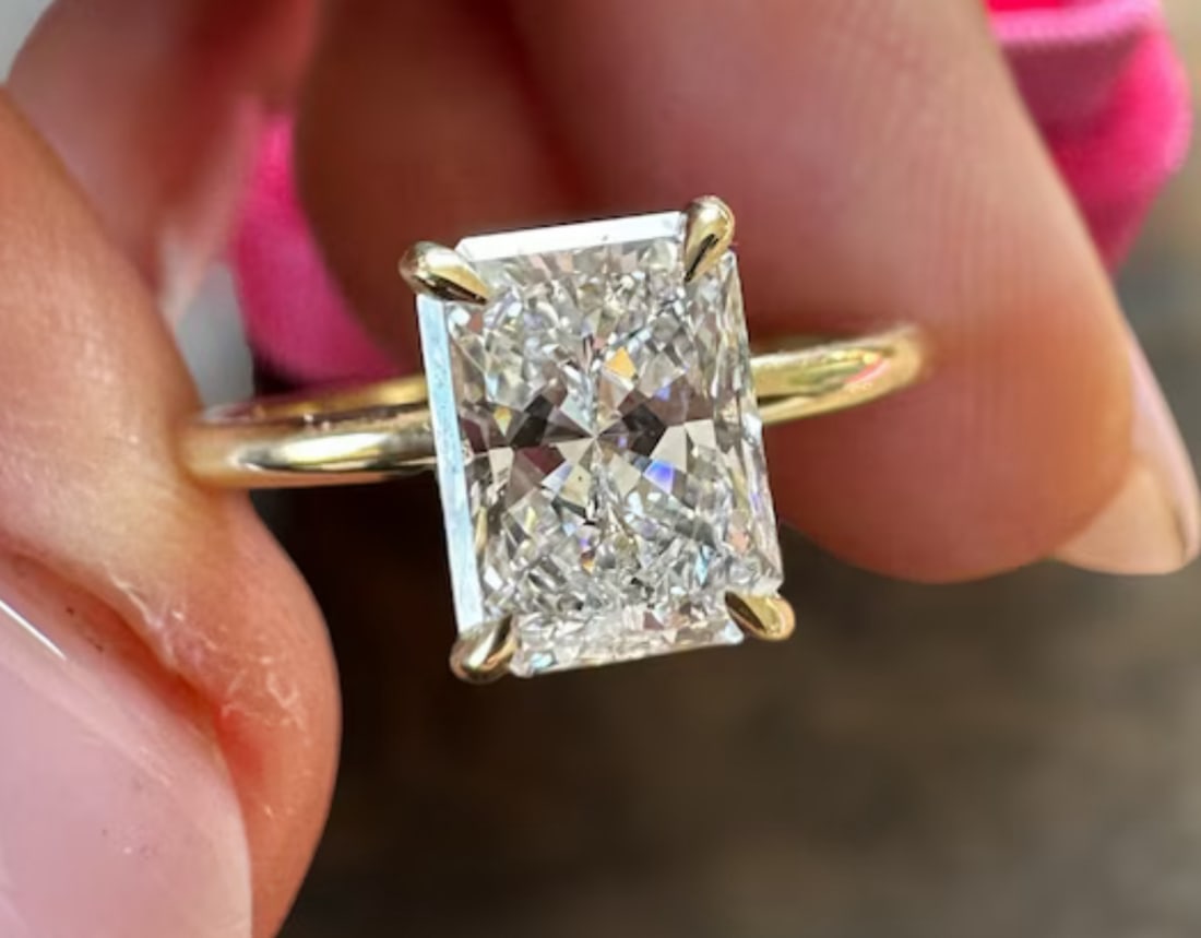 Certified 3 Carat Radiant Cut Lab Grown Diamond D VVS1 Color 14kt Solid Yellow Gold Engagement Ring: Certified 3 Carat Radiant Cut Lab Grown Diamond D VVS1 Color 14kt Solid Yellow Gold Engagement Ring - Side Stone Lab Grown Diamonds 0.40 CT Round Cut VS1 E Color - Ring Size US 7