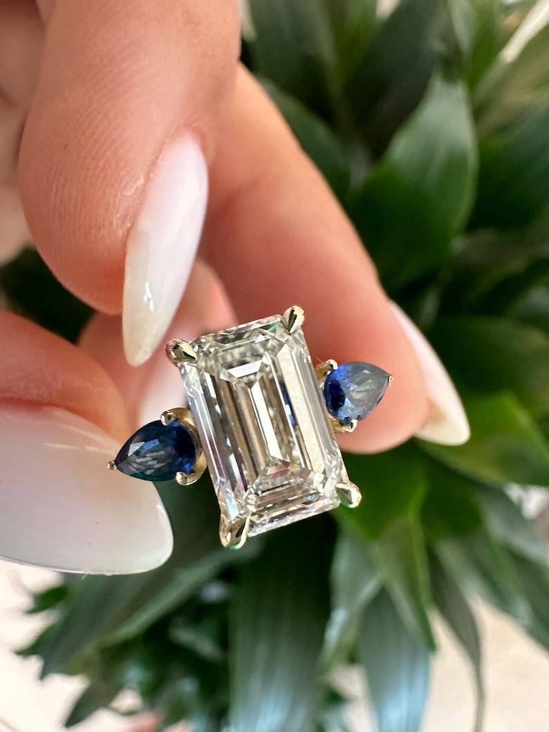 Certified 5 Carat Emerald Cut Lab Grown Diamond D VVS1 Color 14kt Solid White Gold Engagement Ring: Certified 5 Carat Emerald Cut Lab Grown Diamond D VVS1 Color 14kt Solid White Gold Engagement Ring -Ring Size US 7 - Blue lab grown sapphire - 1.20 Ct