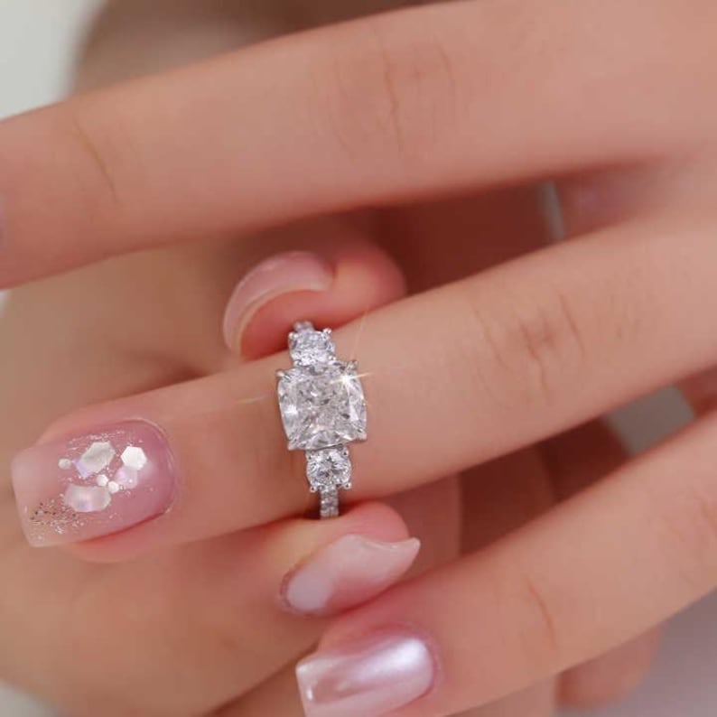 Certified 3 Carat Cushion Cut Lab Grown Diamond VVS1 D Color 14kt Solid White Gold Engagement Ring: Certified 3 Carat Cushion Cut Lab Grown Diamond VVS1 D Color 14kt Solid White Gold Engagement Ring - Side Diamonds is 0.60 ct vs1 e color round cut - Ring Size US - 6 -Ring Size US 6- Ring Resize Avai