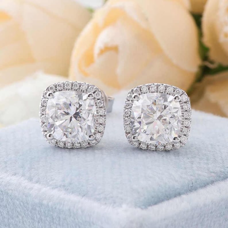 Certified 6 Carat Cushion Cut Lab Grown Diamond VVS1 D Color 14kt Solid White Gold Earrings: Certified 6 Carat Cushion Cut Lab Grown Diamond VVS1 D Color 14kt Solid White Gold Earrings Side Stone is Lab Grwon Diamonds Round Cut VS1 E Color 0. 30 Ct