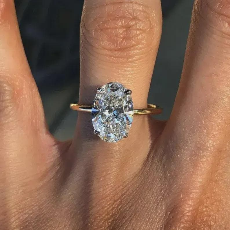 Certified 3.00 Carat Oval Cut Lab Grown Diamond D VVS1 Color 14kt Solid Yellow Gold Engagement Ring: Certified 3.00 Carat Oval Cut Lab Grown Diamond D VVS1 Color 14kt Solid Yellow Gold Engagement Ring - Side Stone Lab Grown Diamonds 0.40 CT Round Cut VS1 E Color - Ring Size US 6