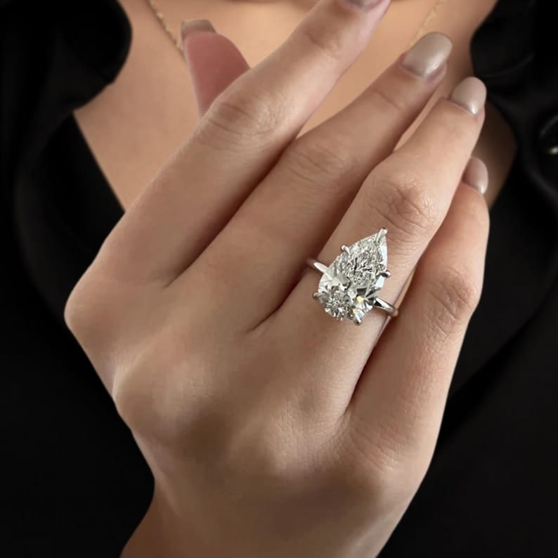 Certified 4 Carat Pear Cut Lab Grown Diamond D VVS1 Color 14kt Solid White Gold Engagement Ring: Certified 4 Carat Pear Cut Lab Grown Diamond D VVS1 Color 14kt Solid White Gold Engagement Ring - Ring Size US -6