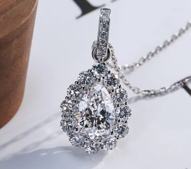 Certified 3.00 Carat Pear Cut Lab Grown Diamond VVS1 D Color 14kt Solid White Gold Pendant: Certified 3.00 Carat Pear Cut Lab Grown Diamond VVS1 D Color 14kt Solid White Gold Pendant - Side Stone is Lab Grown Diamond D VVS1 - Round Cut 0.50 CT