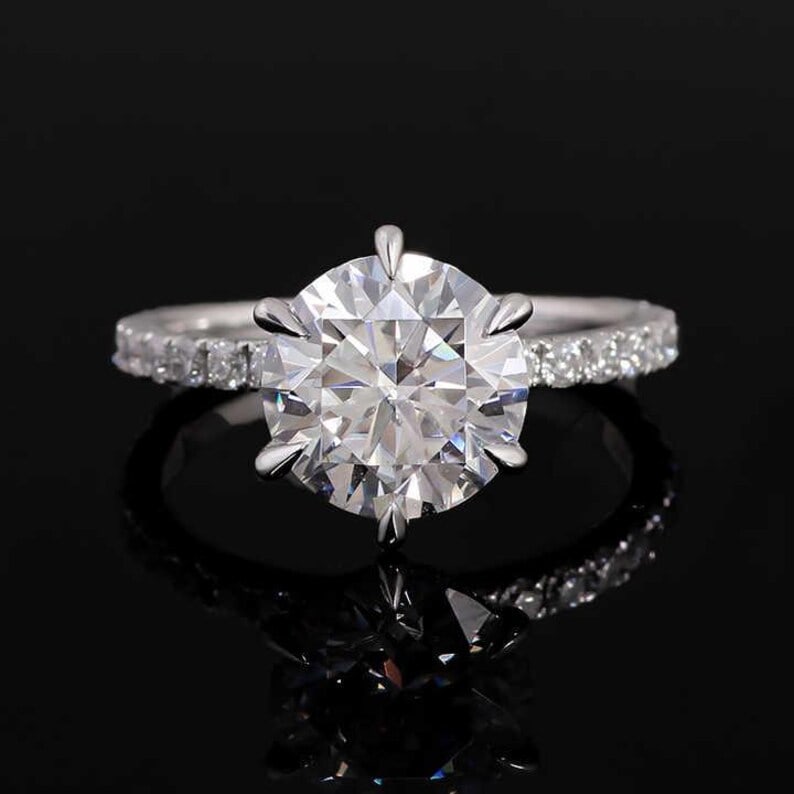 Certified 3 Carat Round Cut Lab Grown Diamond VVS1 D Color 14kt Solid White Gold Engagement Ring: Certified 3 Carat Round Cut Lab Grown Diamond VVS1 D Color 14kt Solid White Gold Engagement Ring - Side Diamonds is 0.45 ct vs1 e color round cut - Ring Size US 7 - Ring Resize Available free of cost 