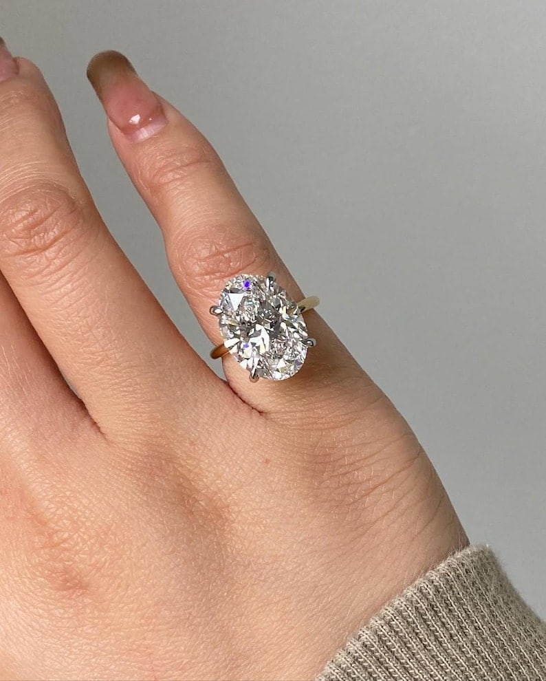Certified 10 Carat Oval Cut Lab Grown Diamond VVS1 E Color 14kt Solid Yellow Gold Engagement Ring: Certified 10 Carat Oval Cut Lab Grown Diamond VVS1 E Color 14kt Solid Yellow Gold Engagement Ring - Side Diamonds 0.60 CT VS1 E Color - Ring Size US 6 - Ring Resize Available free of Cost - Free Shipp